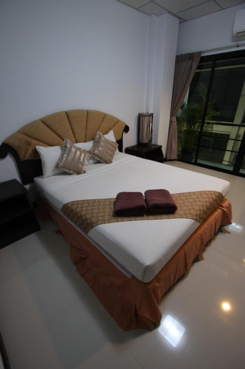 Orchid Residence Samui Praia Chaweng Quarto foto